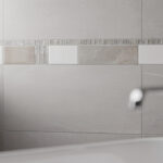 découvrez comment choisir la frise de carrelage parfaite pour sublimer votre salle de bain avec style et harmonie.